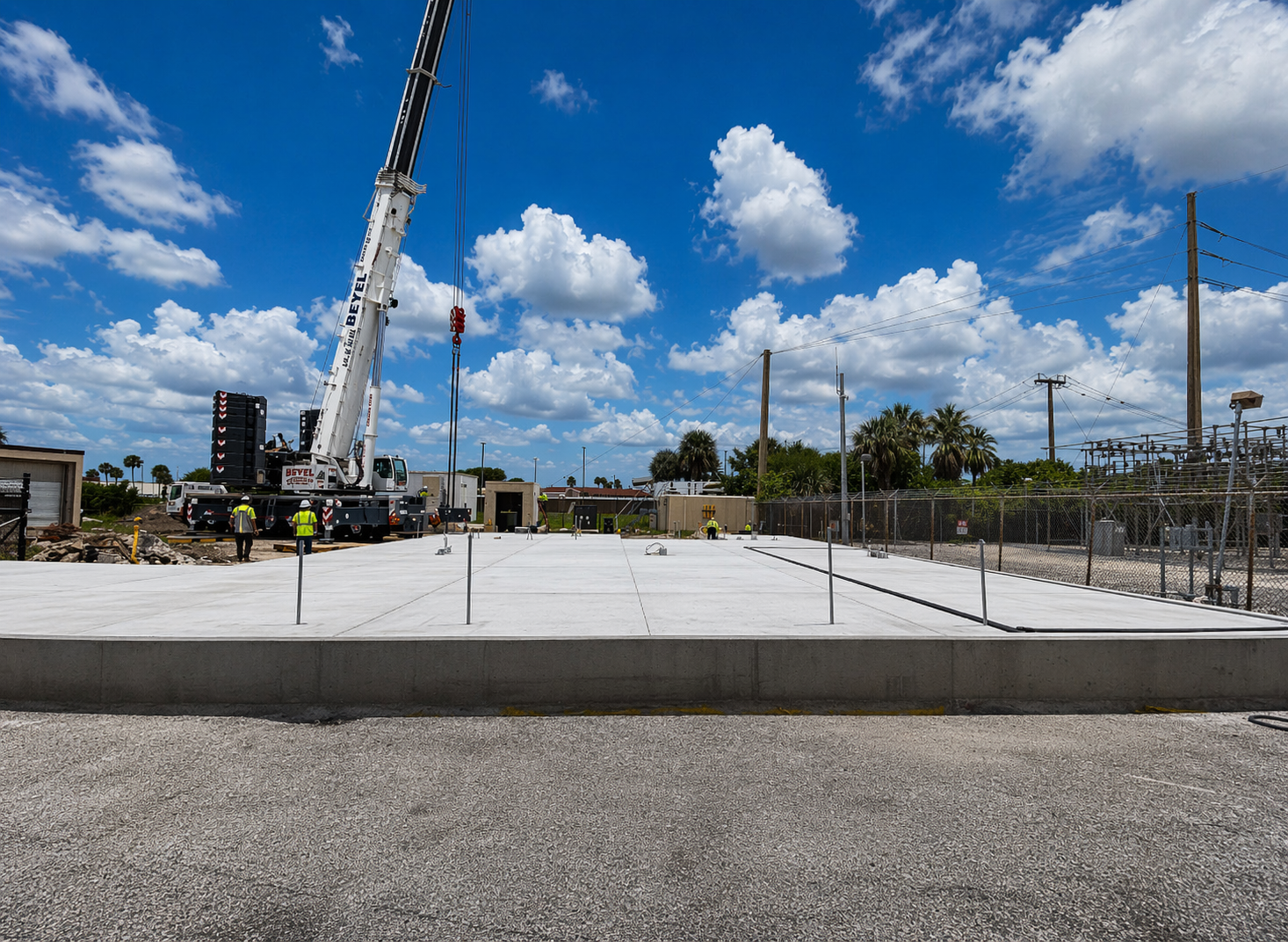 Atlantic Space Coast - Construction site with crane and workers